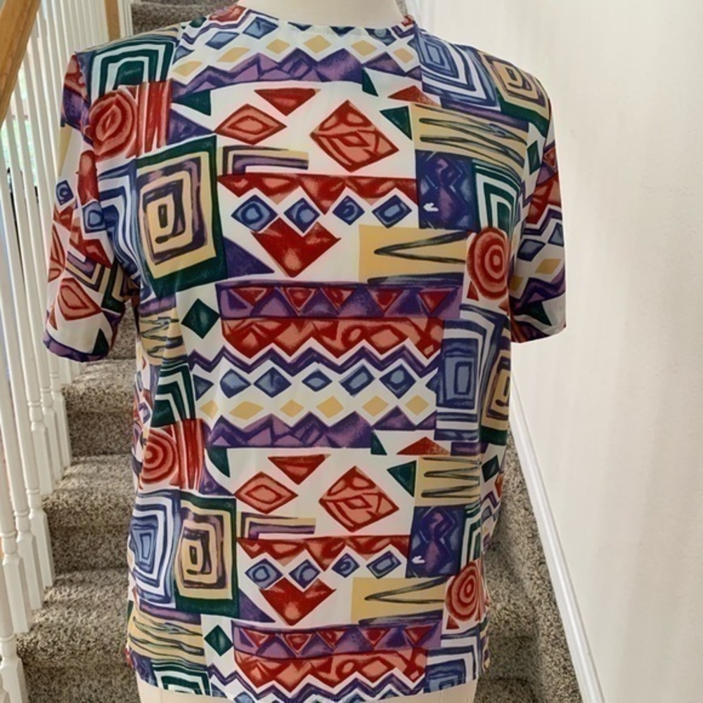 33 Dover St. Abstract print top with matching capris (free) with top purchase.